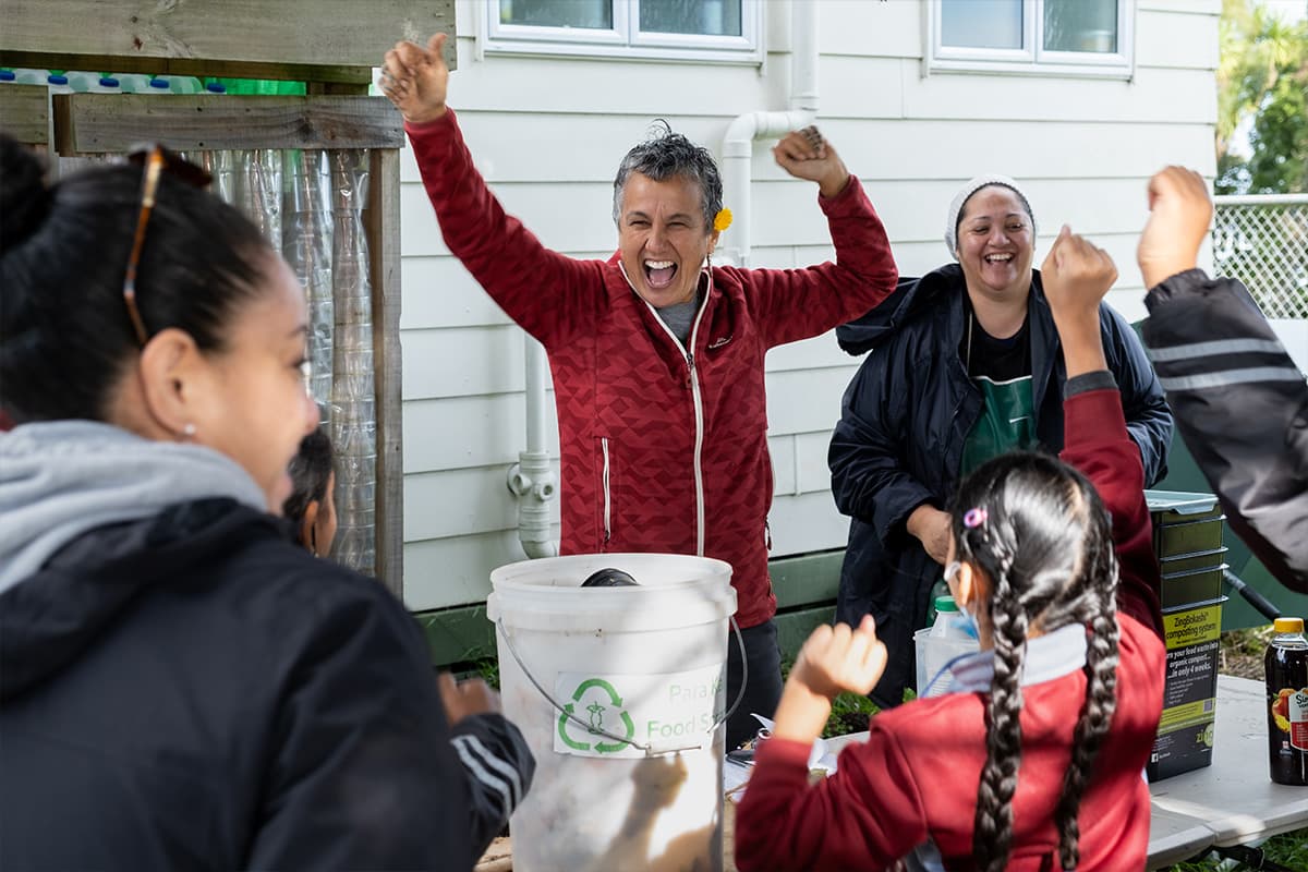 Neighbours cheering together outdoors